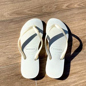 Havaianas. White with pearl white strap. Worn once!